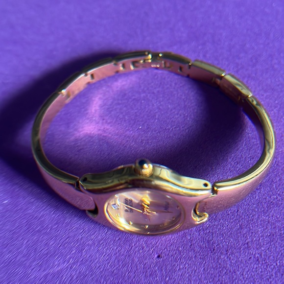 Armitron Now Gold Tone Ladies Bangle Bracelet Watch - Picture 11 of 15